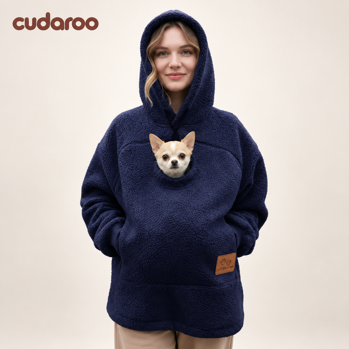Cudaroo pet pouch hoodie in navy blue with a small chihuahua in the chest pouch