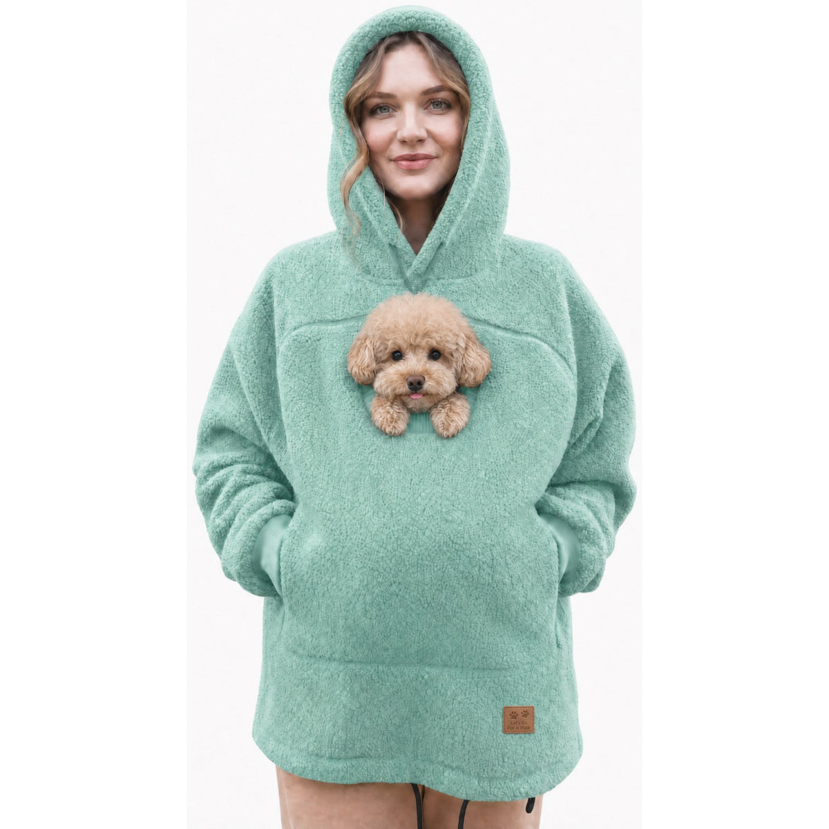 Cudaroo pet pouch hoodie in turquoise with a small poodle in the pouch