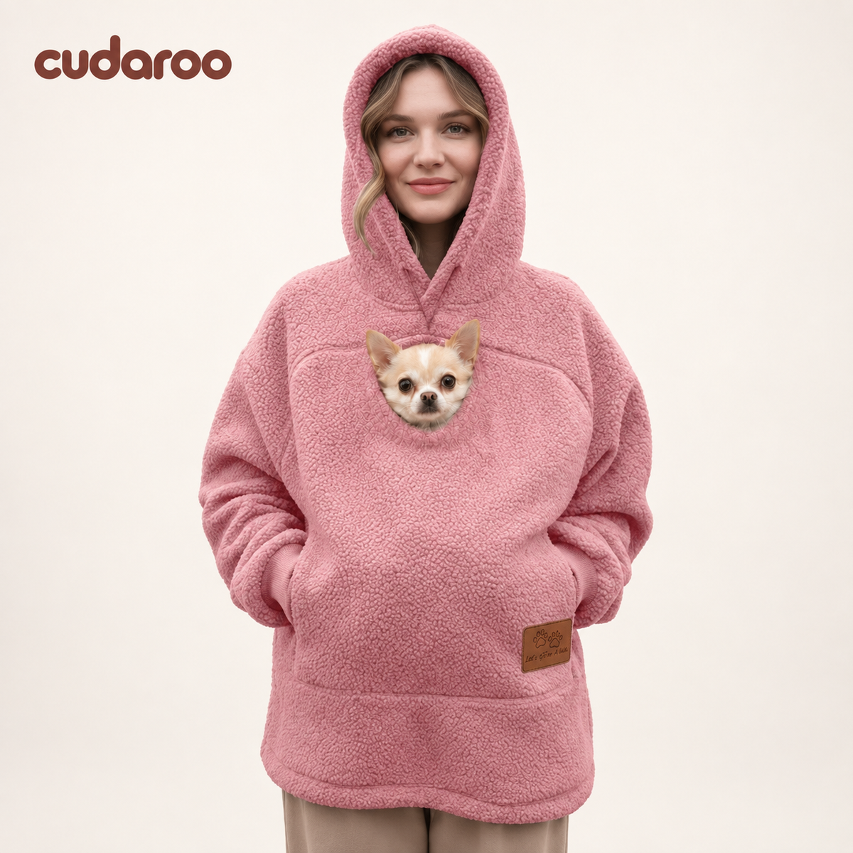 Cudaroo pet pouch hoodie in pink with a small chihuahua in the chest pouch